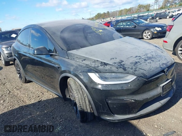 2023 Tesla Model X with VIN 7SAXCAE59PF377408, listed as a IAAI auction lot 41176738 with 32,496 mi miles and . Bid and sale history available at DreamBid. Image 1.