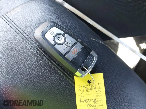 2021 Ford Mustang EcoBoost with VIN 1FA6P8TH8M5146814, listed as a IAAI auction lot 42320578 with 94,237 mi miles and . Bid and sale history available at DreamBid. Image 11.