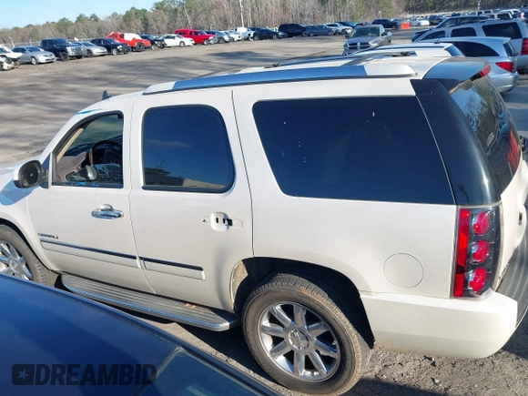 2013 GMC Yukon Denali with VIN 1GKS1EEF0DR121701, listed as a IAAI auction lot 41814818 with 137,177 mi miles. Bid and sale history available at carsss.com. Image 14.