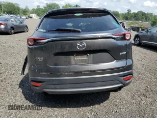 2019 Mazda CX-9 Touring z VIN JM3TCBCY5K0328655, wystawiony jako Copart lot #64627255 z przebiegiem 54 658 mil mil oraz Szkoda całkowita • Salvage title. Historia ofert i sprzedaży dostępna na DreamBid. Obrazek 6.