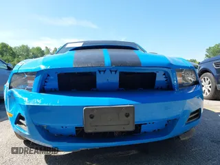2012 Ford Mustang Premium with VIN 1ZVBP8AM2C5257752, listed as a IAAI auction lot 42817735 with 128,015 mi miles and . Bid and sale history available at DreamBid. Image 6.