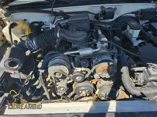 2000 Cadillac Escalade z VIN 1GYEK63R3YR218285, wystawiony jako Copart lot #77915654 z przebiegiem 190 444 mil mil oraz Tytuł czysty. Historia ofert i sprzedaży dostępna na DreamBid. Obrazek 7.