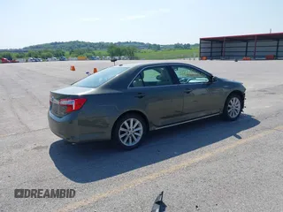 2012 Toyota Camry XLE z VIN 4T1BD1FK7CU037762, wystawiony jako IAAI lot #42253606 z przebiegiem 130 888 mil mil oraz . Historia ofert i sprzedaży dostępna na DreamBid. Obrazek 4.