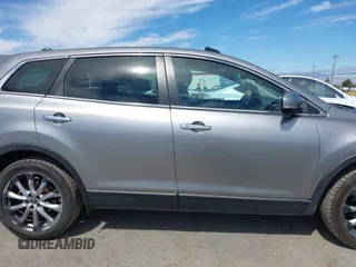 2014 Mazda CX-9 Grand Touring z VIN JM3TB2DVXE0432991, wystawiony jako IAAI lot #42826784 z przebiegiem 134 265 mil mil oraz . Historia ofert i sprzedaży dostępna na DreamBid. Obrazek 13.