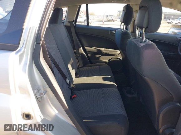 2012 Dodge Caliber SXT with VIN 1C3CDWDAXCD508338, listed as a IAAI auction lot 42091675 with 213,596 mi miles and . Bid and sale history available at DreamBid. Image 8.