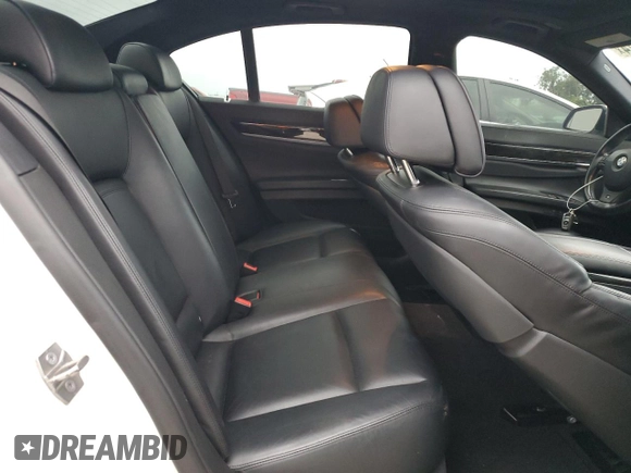 2013 BMW 7 Series 750i with VIN WBAYA8C54DC996569, listed as a Copart auction lot 74199774 with 107,871 mi miles and Salvage Title. Bid and sale history available at DreamBid. Image 10.