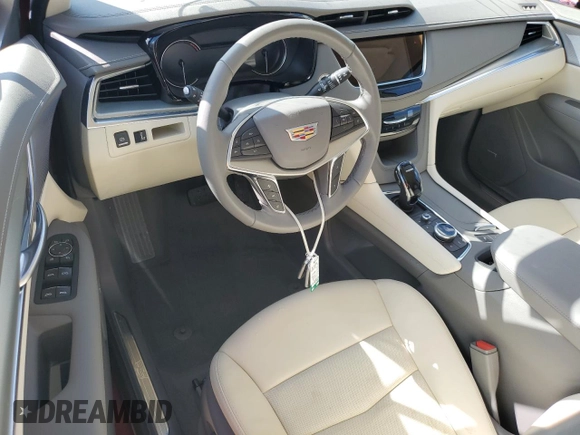 2024 Cadillac XT5 FWD Premium Luxury with VIN 1GYKNCRS3RZ737955, listed as a Copart auction lot 77241674 with 0 mi miles and Salvage Title. Bid and sale history available at carsss.com. Image 8.
