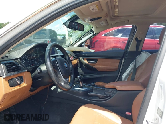 2013 BMW 3 Series 328i z VIN WBA3A5C51DJ461736, wystawiony jako IAAI lot #42662559 z przebiegiem 152 985 mil mil oraz . Historia ofert i sprzedaży dostępna na DreamBid. Obrazek 5.