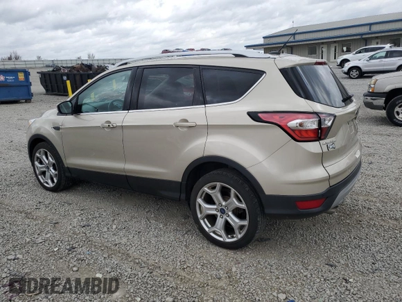 2017 Ford Escape Titanium with VIN 1FMCU0J98HUD75004, listed as a Copart auction lot 51627805 with 74,166 mi miles and Salvage Title. Bid and sale history available at carsss.com. Image 2.