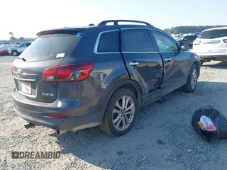 2013 Mazda CX-9 Grand Touring z VIN JM3TB2DA6D0424124, wystawiony jako IAAI lot #42032588 z przebiegiem 151 569 mil mil oraz . Historia ofert i sprzedaży dostępna na DreamBid. Obrazek 4.