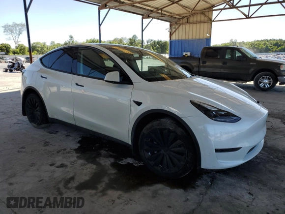 2024 Tesla Model Y с VIN 7SAYGDED5RF086456, выставлен на аукционе Copart как лот 57994835 с пробегом Не указан миль и Списание • Salvage title. История ставок и продаж доступна на DreamBid. Изображение 4.