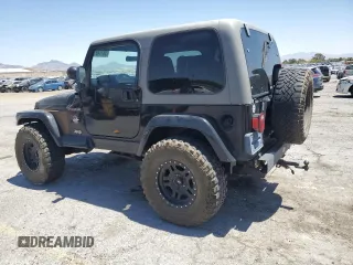 1999 Jeep Wrangler Sahara with VIN 1J4FY49S8XP472733, listed as a Copart auction lot 58174915 with 170,838 mi miles and Salvage title. Bid and sale history available at DreamBid. Image 2.