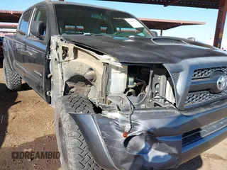 2011 Toyota Tacoma with VIN 3TMMU4FN0BM032561, listed as a IAAI auction lot 41190472 with 188,862 mi miles and . Bid and sale history available at DreamBid. Image 6.