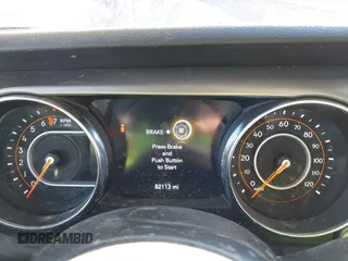 2020 Jeep Wrangler Unlimited Sport Altitude z VIN 1C4HJXDG0LW171400, wystawiony jako IAAI lot #41373446 z przebiegiem 82 113 mil mil oraz . Historia ofert i sprzedaży dostępna na DreamBid. Obrazek 7.