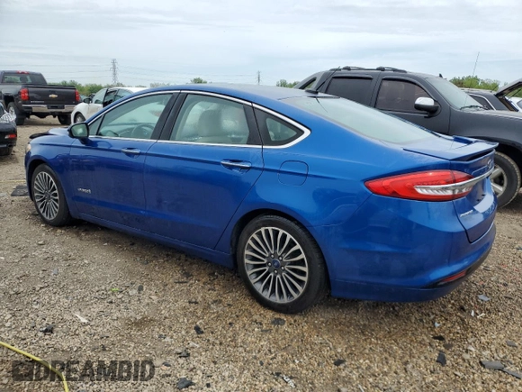 2017 Ford Fusion Hybrid Titanium with VIN 3FA6P0RU1HR138725, listed as a Copart auction lot 56650625 with 77,331 mi miles and Salvage title. Bid and sale history available at DreamBid. Image 2.