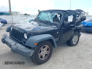 2015 Jeep Wrangler Freedom Edition with VIN 1C4AJWAG4FL681688, listed as a IAAI auction lot 42488018 with Not provided miles and . Bid and sale history available at DreamBid. Image 2.