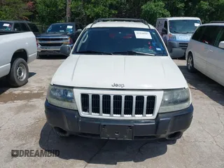 2004 Jeep Grand Cherokee Laredo z VIN 1J4GX48S74C152542, wystawiony jako IAAI lot #42350507 z przebiegiem 176 366 mil mil oraz . Historia ofert i sprzedaży dostępna na DreamBid. Obrazek 6.