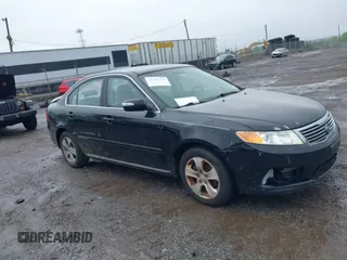 2009 Kia Optima LX z VIN KNAGE228X95314637, wystawiony jako IAAI lot #42287118 z przebiegiem 137 650 mil mil oraz . Historia ofert i sprzedaży dostępna na DreamBid. Obrazek 1.