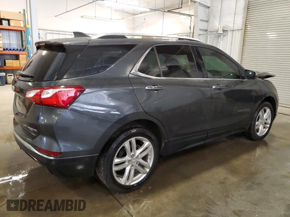 2019 Chevrolet Equinox Premier z VIN 3GNAXYEX6KL195023, wystawiony jako Copart lot #59099375 z przebiegiem 95 586 mil mil oraz Szkoda całkowita • Salvage title. Historia ofert i sprzedaży dostępna na DreamBid. Obrazek 3.