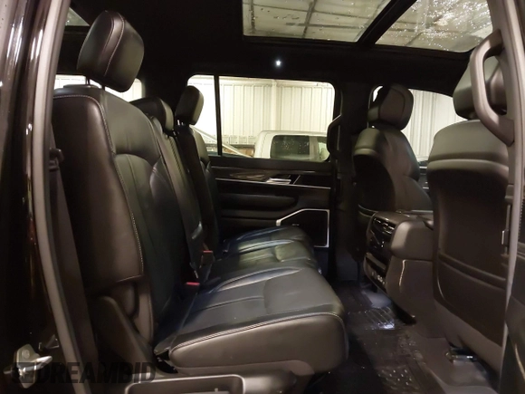 2022 Jeep Wagoneer Series II with VIN 1C4SJVBT5NS127476, listed as a IAAI auction lot 41807474 with 48,703 mi miles and . Bid and sale history available at DreamBid. Image 8.
