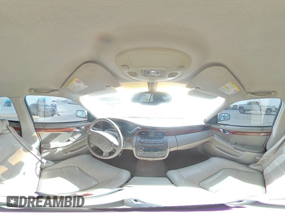 2004 Cadillac DeVille z VIN 1G6KD54Y54U181978, wystawiony jako Copart lot #47458905 z przebiegiem 145 708 mil mil oraz Szkody całkowita. Historia ofert i sprzedaży dostępna na DreamBid. Obrazek 13.