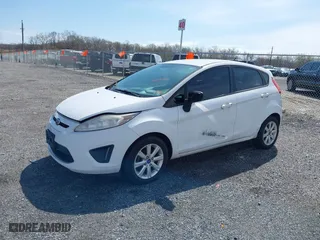 2011 Ford Fiesta SE with VIN 3FADP4EJ3BM231633, listed as a IAAI auction lot 41915946 with 130,891 mi miles. Bid and sale history available at carsss.com. Image 2.