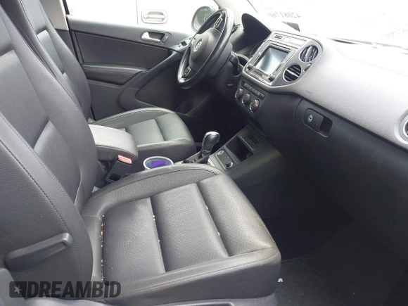 2016 Volkswagen Tiguan S with VIN WVGBV7AX6GW542656, listed as a IAAI auction lot 42081760 with 85,200 mi miles and . Bid and sale history available at DreamBid. Image 5.