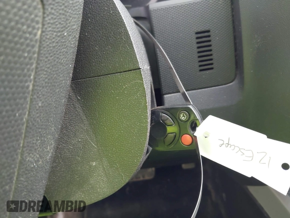 2012 Ford Escape XLT with VIN 1FMCU0D73CKC24957, listed as a IAAI auction lot 42612501 with 140,686 mi miles and . Bid and sale history available at DreamBid. Image 11.