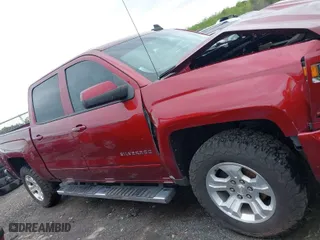 2017 Chevrolet Silverado 1500 LT with VIN 3GCUKREC8HG336120, listed as a IAAI auction lot 41919441 with 64,029 mi miles. Bid and sale history available at carsss.com. Image 13.