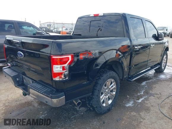 2018 Ford F-150 XL with VIN 1FTEW1E51JFD38844, listed as a IAAI auction lot 41911102 with 116,887 mi miles. Bid and sale history available at carsss.com. Image 4.