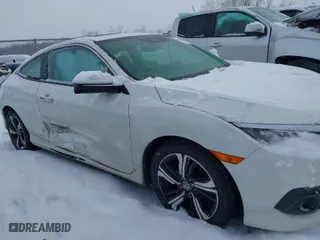 2016 Honda Civic Coupe Touring with VIN 2HGFC3B91GH351389, listed as a IAAI auction lot 41612467 with 78,934 mi miles. Bid and sale history available at carsss.com. Image 13.