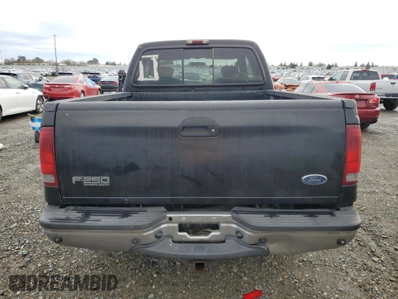 2003 Ford Super Duty F-250 XL with VIN 1FTNX21L13EB63351, listed as a Copart auction lot 85092674 with 265,515 mi miles and Salvage Title. Bid and sale history available at carsss.com. Image 6.