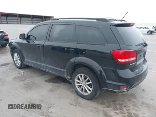 2014 Dodge Journey SXT with VIN 3C4PDCBG9ET259028, listed as a IAAI auction lot 41400287 with 192,979 mi miles and . Bid and sale history available at DreamBid. Image 3.