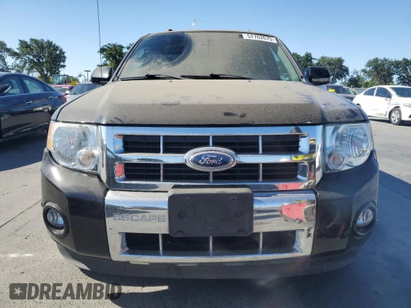 2012 Ford Escape Limited z VIN 1FMCU9EG3CKA65246, wystawiony jako Copart lot #57762675 z przebiegiem 161 568 mil mil oraz Szkoda całkowita • Salvage title. Historia ofert i sprzedaży dostępna na DreamBid. Obrazek 5.