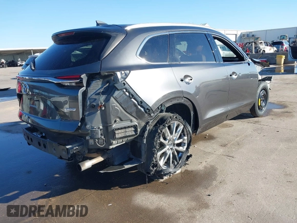 2017 Mazda CX-9 Signature with VIN JM3TCBEY6H0129927, listed as a IAAI auction lot 41739530 with 67,913 mi miles and . Bid and sale history available at DreamBid. Image 4.