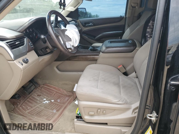 2015 Chevrolet Tahoe LS with VIN 1GNSCAKC5FR308614, listed as a Copart auction lot 60138355 with 145,797 mi miles and Salvage title. Bid and sale history available at DreamBid. Image 7.