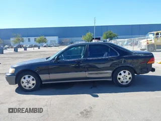 1998 Acura RL Special Edition with VIN JH4KA9686WC009959, listed as a IAAI auction lot 41632413 with 130,788 mi miles. Bid and sale history available at carsss.com. Image 15.