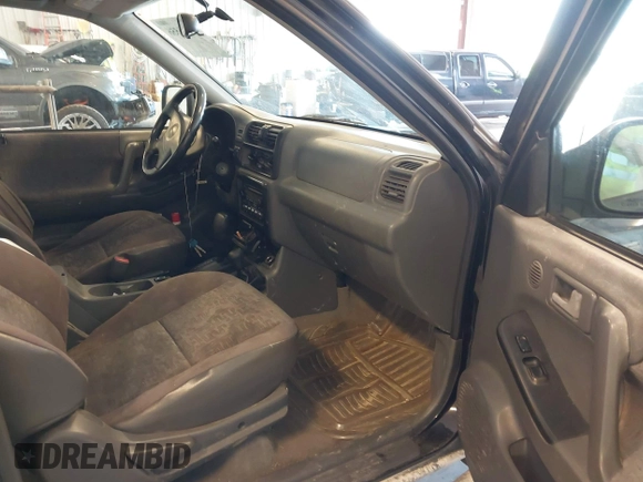 2002 Isuzu Rodeo with VIN 4S2CM57W124335034, listed as a IAAI auction lot 42446556 with 214,718 mi miles and . Bid and sale history available at DreamBid. Image 5.