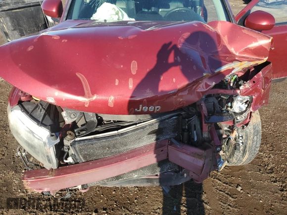 2016 Jeep Compass Latitude with VIN 1C4NJDEB8GD691124, listed as a Copart auction lot 48201175 with 136,842 mi miles and Salvage Title. Bid and sale history available at carsss.com. Image 12.