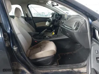 2016 Mazda Mazda3 i Sport with VIN 3MZBM1T7XGM252659, listed as a IAAI auction lot 41465038 with 151,045 mi miles. Bid and sale history available at carsss.com. Image 5.