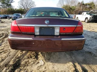 2001 Mercury Grand Marquis LS z VIN 2MEFM75W41X706118, wystawiony jako Copart lot #84484434 z przebiegiem 104 946 mil mil oraz Szkoda całkowita • Salvage title. Historia ofert i sprzedaży dostępna na DreamBid. Obrazek 6.