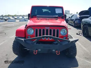 2016 Jeep Wrangler Unlimited Sahara with VIN 1C4BJWEG9GL194499, listed as a IAAI auction lot 42519265 with 84,432 mi miles and . Bid and sale history available at DreamBid. Image 12.