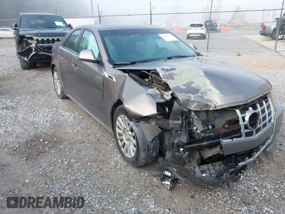 2012 Cadillac CTS with VIN 1G6DA5E50C0152500, listed as a IAAI auction lot 41864677 with 163,594 mi miles and . Bid and sale history available at DreamBid. Image 1.