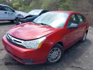 2009 Ford Focus SE with VIN 1FAHP35N89W243205, listed as a IAAI auction lot 42149989 with 148,058 mi miles. Bid and sale history available at carsss.com. Image 2.