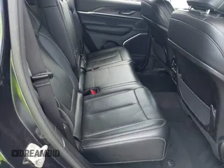 2024 Jeep Grand Cherokee with VIN 1C4RJYB63RC710199, listed as a IAAI auction lot 42484237 with 45,318 mi miles and . Bid and sale history available at DreamBid. Image 8.