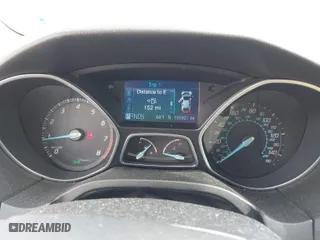 2012 Ford Focus SEL with VIN 1FAHP3H27CL387869, listed as a IAAI auction lot 41976528 with 106,927 mi miles. Bid and sale history available at carsss.com. Image 7.