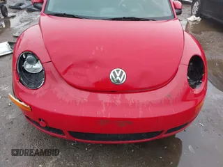 2006 Volkswagen New Beetle Coupe with VIN 3VWRW31C46M409251, listed as a IAAI auction lot 41413298 with 129,972 mi miles. Bid and sale history available at carsss.com. Image 6.