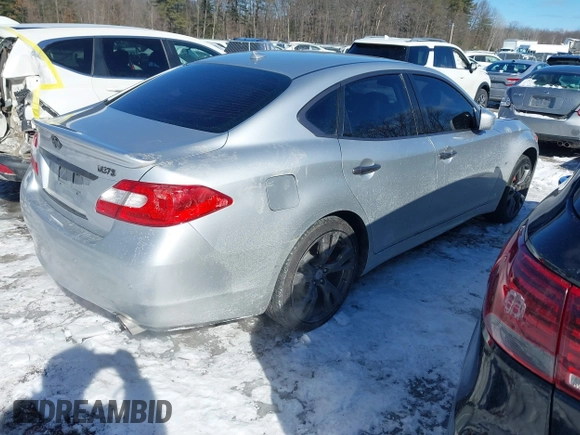 2013 Infiniti M z VIN JN1BY1AR6DM602407, wystawiony jako IAAI lot #41617455 z przebiegiem 99 195 mil mil oraz . Historia ofert i sprzedaży dostępna na DreamBid. Obrazek 4.
