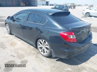 2012 Honda Civic Si z VIN 2HGFB6E57CH700823, wystawiony jako IAAI lot #42477635 z przebiegiem 144 889 mil mil oraz . Historia ofert i sprzedaży dostępna na DreamBid. Obrazek 3.