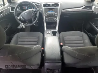 2017 Ford Fusion Hybrid SE z VIN 3FA6P0LU4HR384645, wystawiony jako Copart lot #56454995 z przebiegiem 165 322 mil mil oraz Czysty tytuł • Clean title. Historia ofert i sprzedaży dostępna na DreamBid. Obrazek 8.